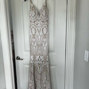 White sequin lace fit and flare dress. Nude line. Deep v formal dress.